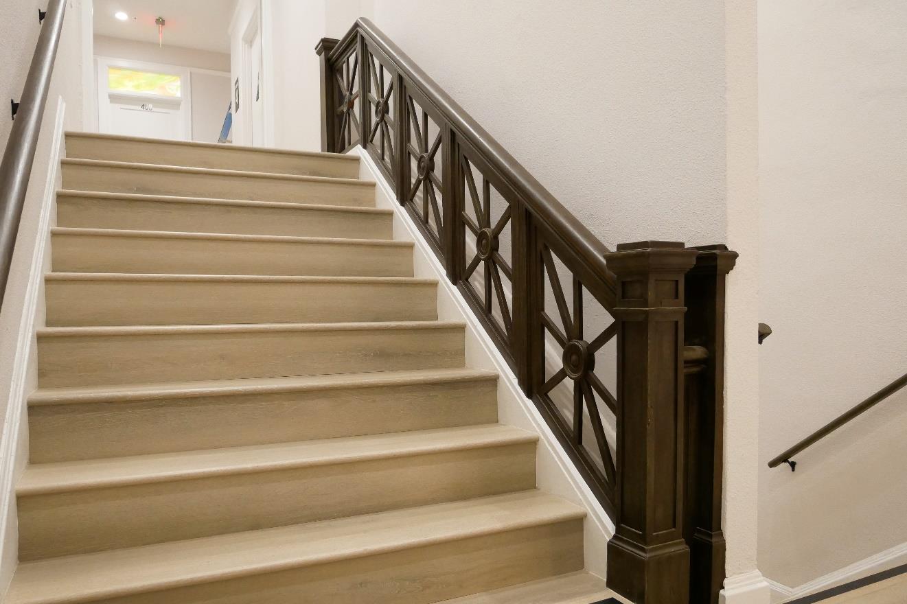 Main stairs, restored balustrade and newel post